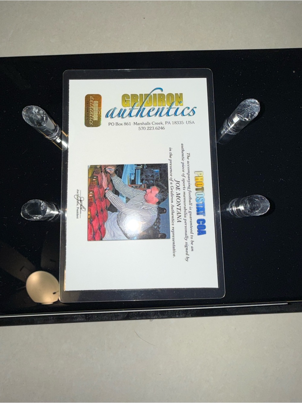 Black Acrylic Display Stand with Clear Pegs - GridIron Authentics Shown